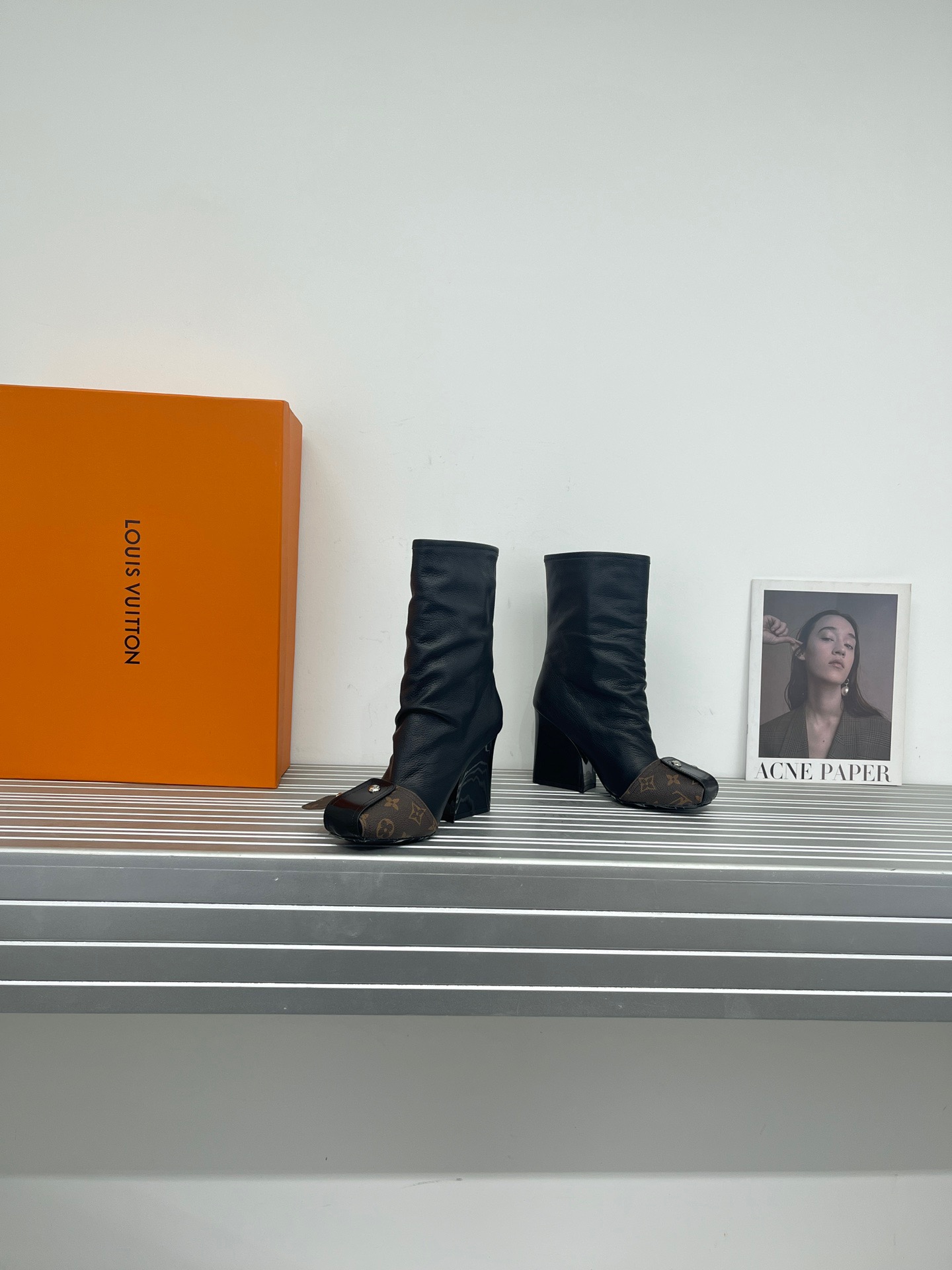 LV Metal nailed back zipper ankle boots