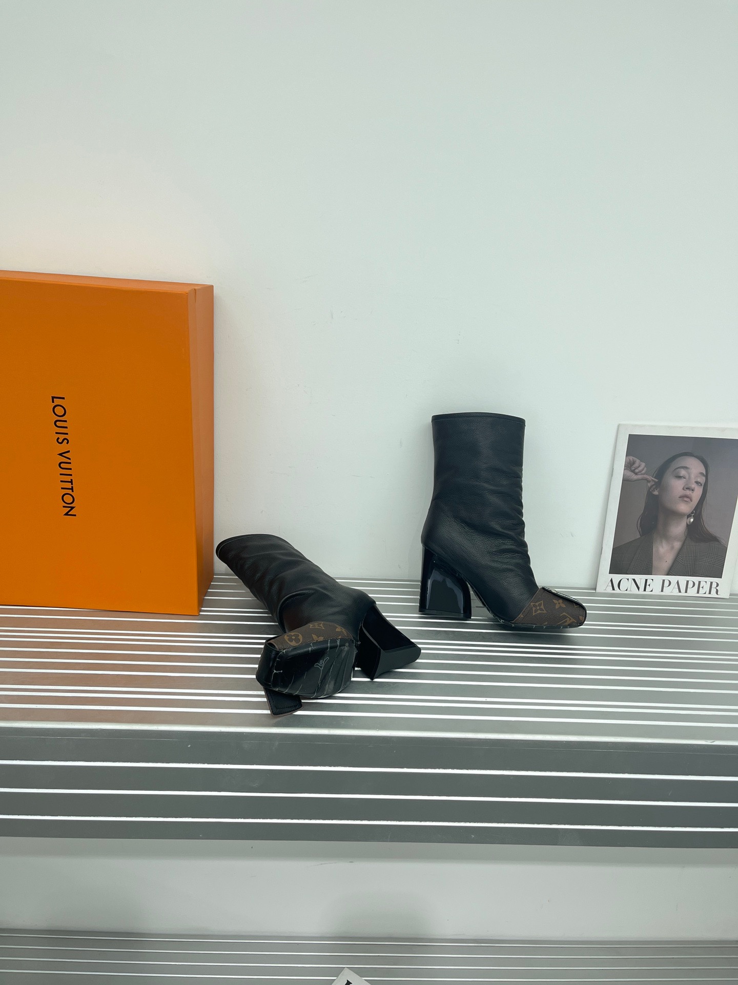 LV Metal nailed back zipper ankle boots