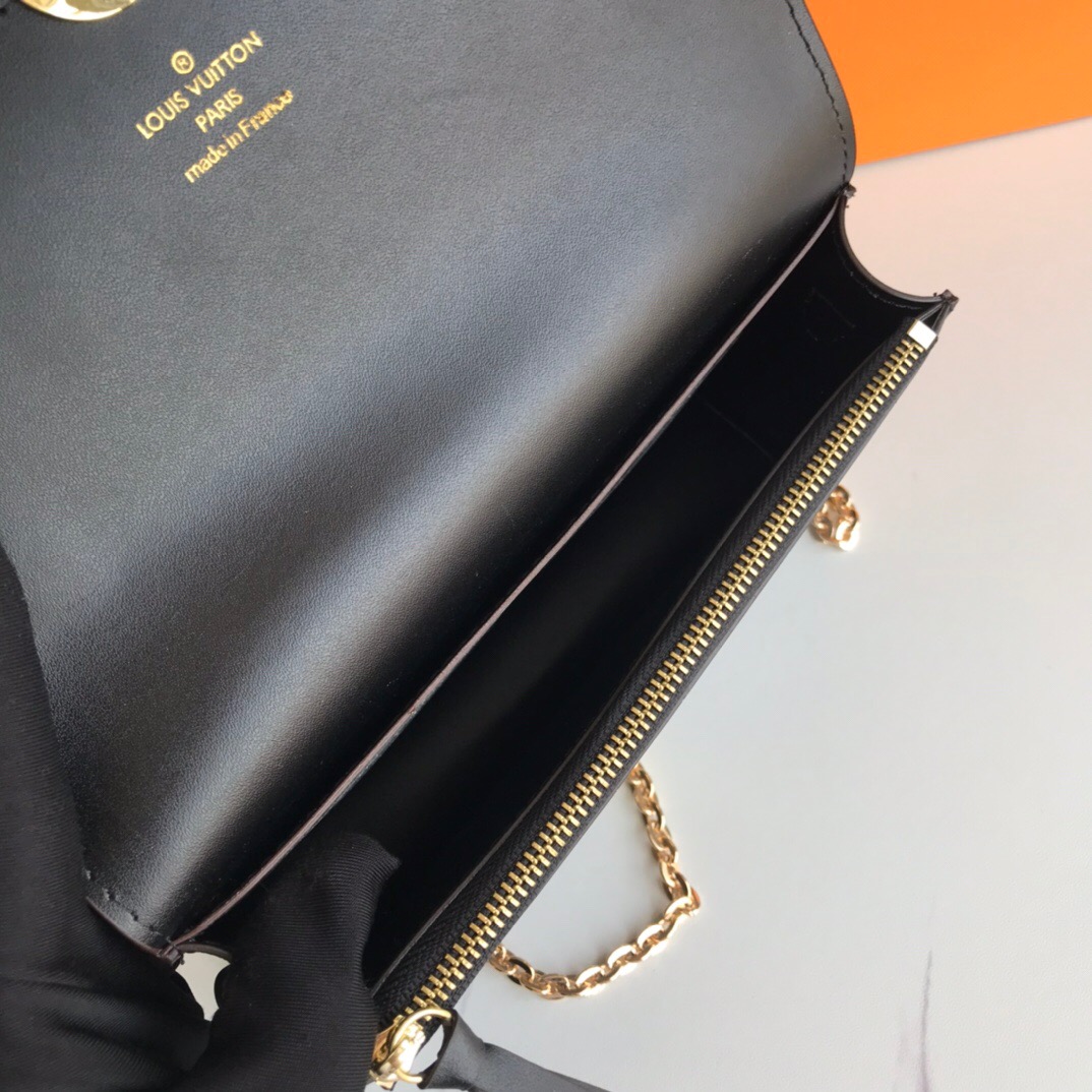 LV A four-leaf clover purse