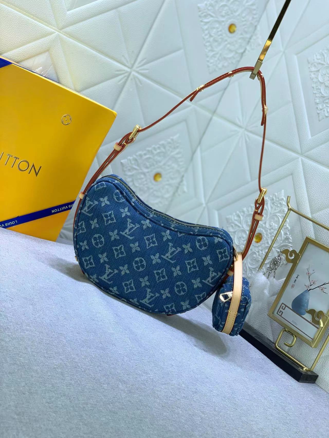 LV CROISSANT Handbag