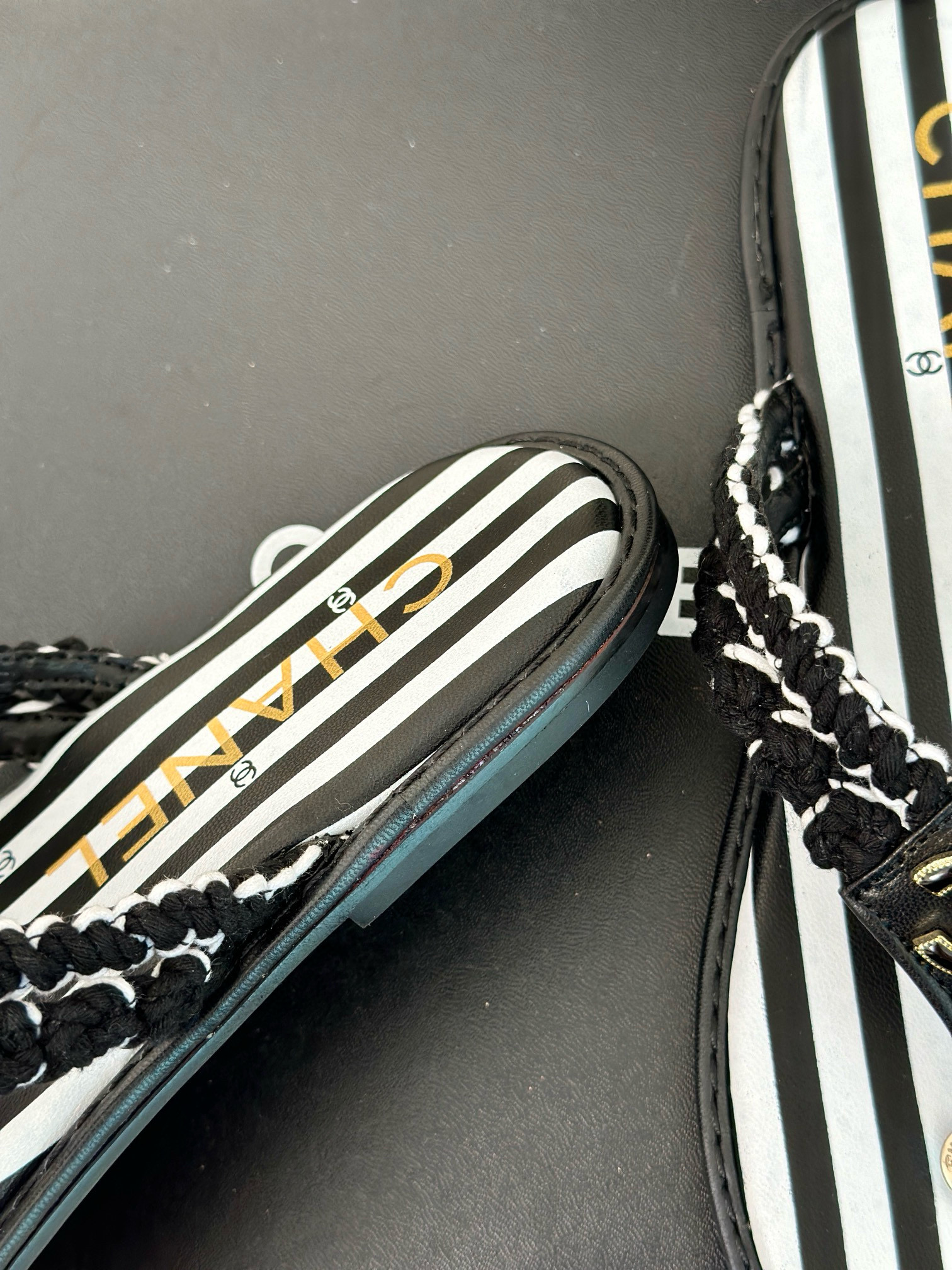 CHANEL Striped flip-flops