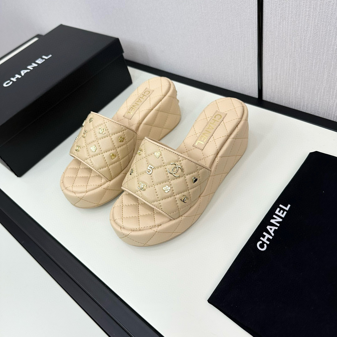 CHANEL hardware embroidered wedge slippers