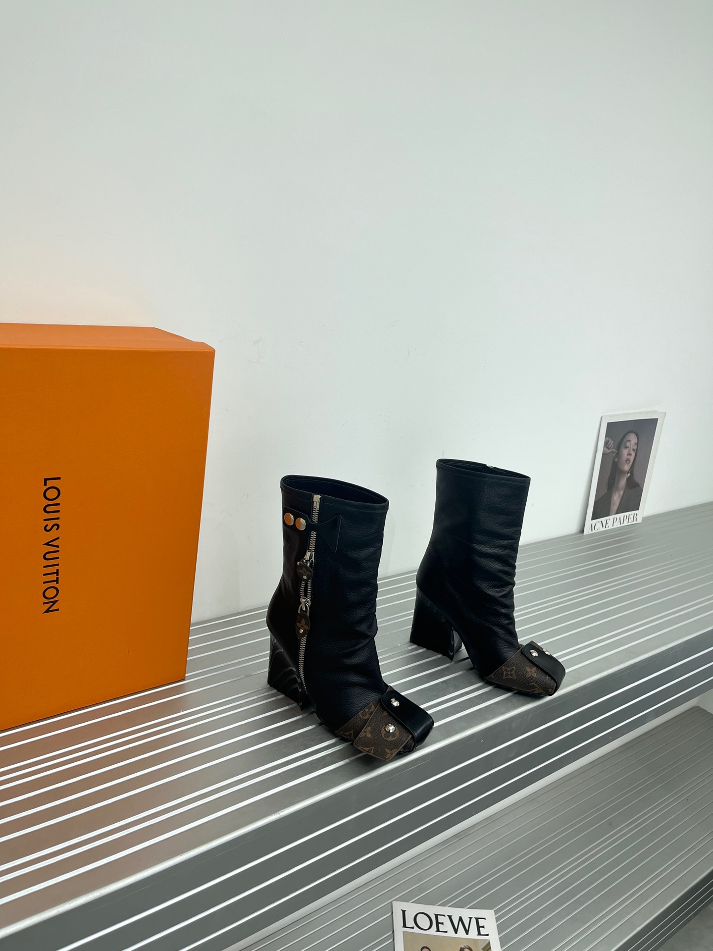 LV Metal nailed back zipper ankle boots