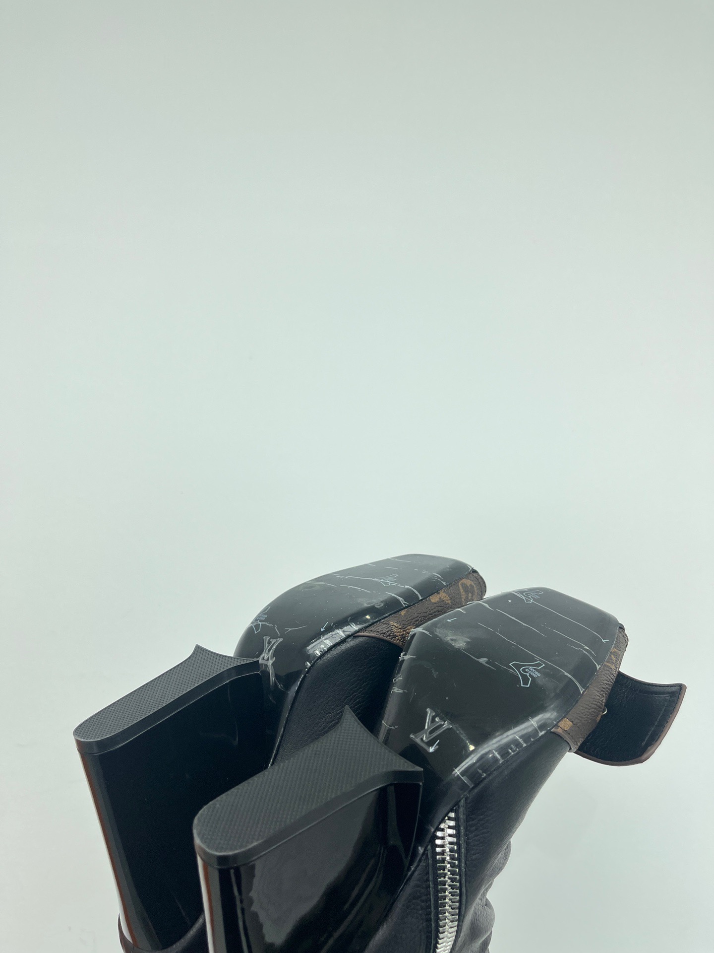 LV Metal nailed back zipper ankle boots