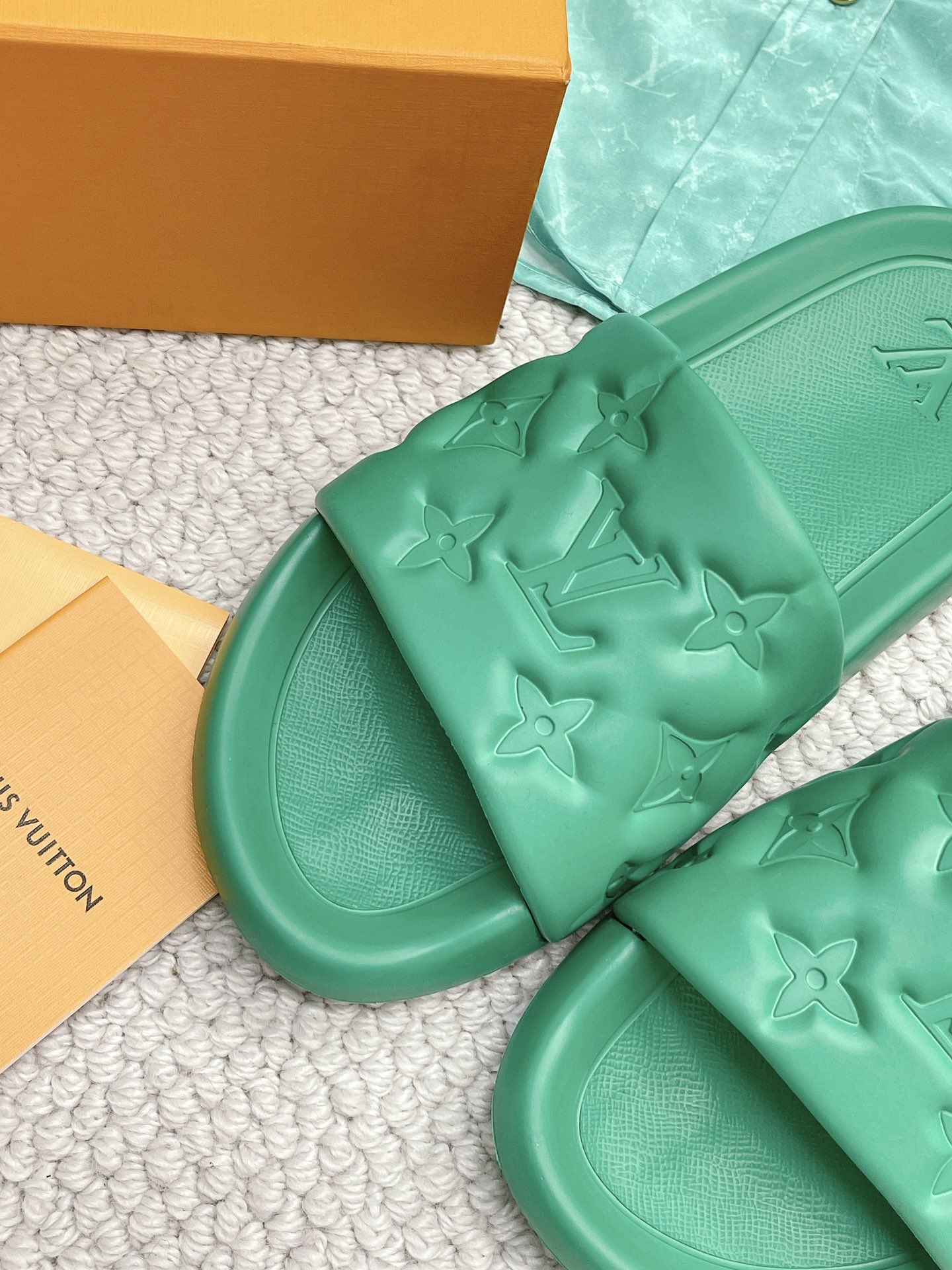 LOUIS VUITTON SLIDES